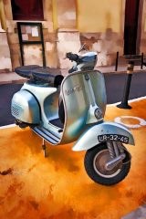 Fotografía artística de vehículos vespa azul